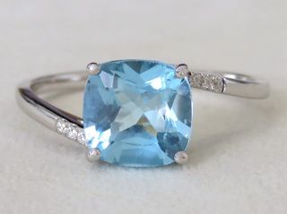 9k White Gold 2.35ct Blue Topaz & Moissanite Ring