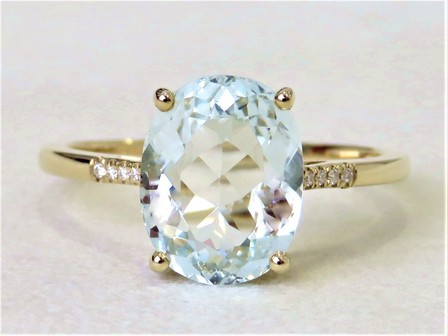 9k Gold Aquamarine and Moissanite Ring