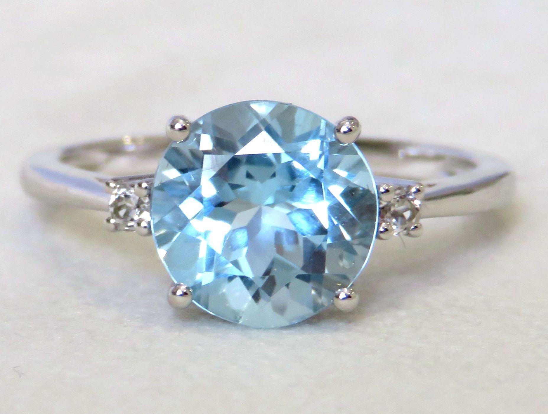 9k White Gold 3.25ct Aqua Blue Topaz & 0.4ct White Sapphire Ring
