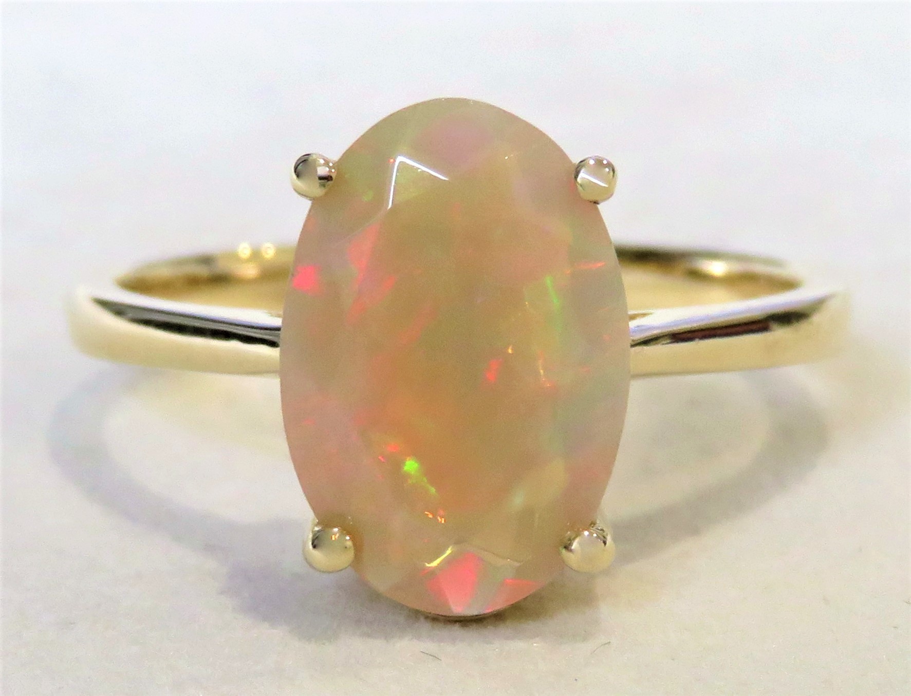 9k Yellow Gold 1.62ct Welo Rainbow Opal Ring