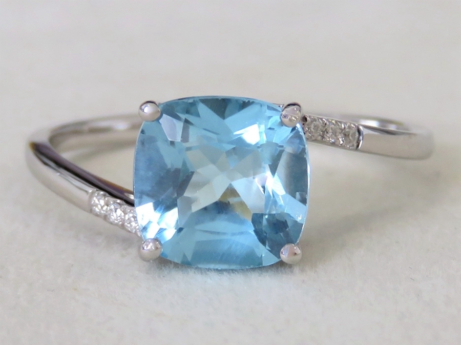 9k White Gold 2.35ct Blue Topaz & Moissanite Ring