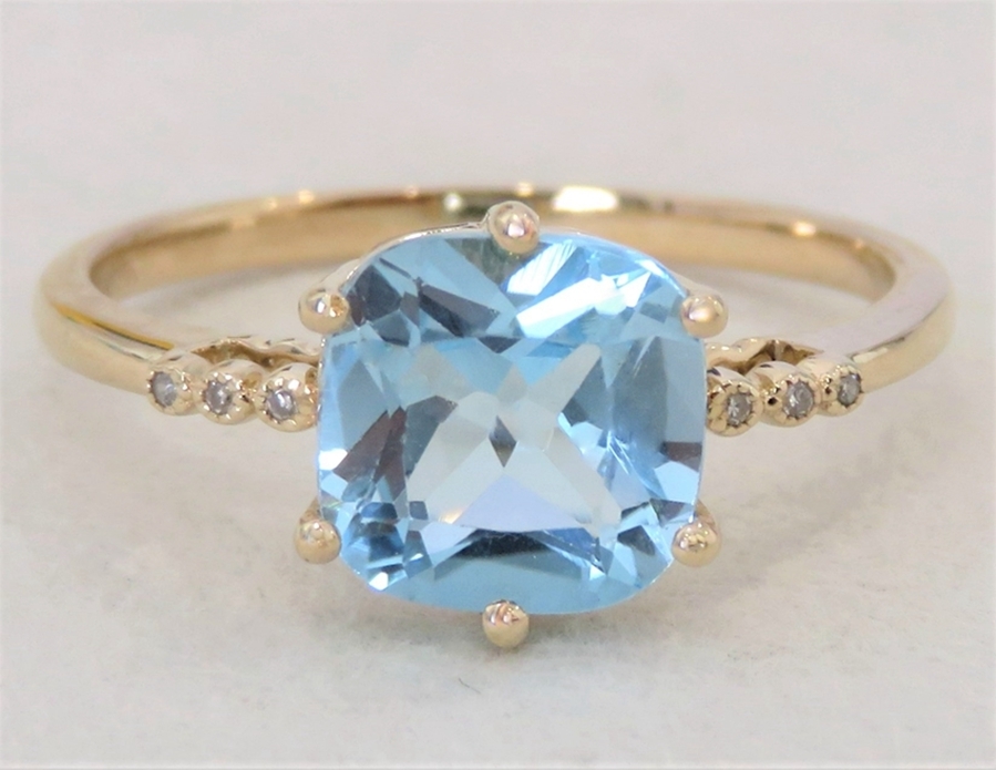 9k Yellow Gold 2.5ct Blue Topaz & Moissanite Ring
