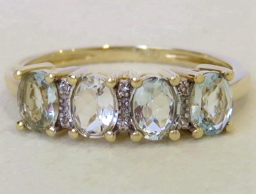 9k Yellow Gold Aquamarine & White Sapphire Ring
