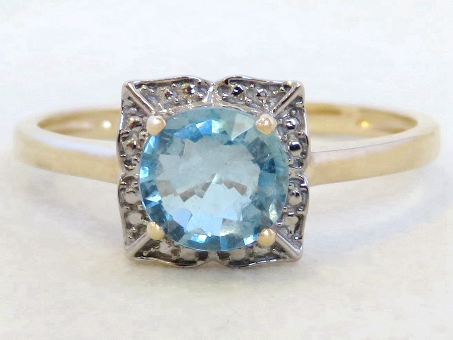 Aquamarine Floral Design Ring in 9k Yellow & White Gold