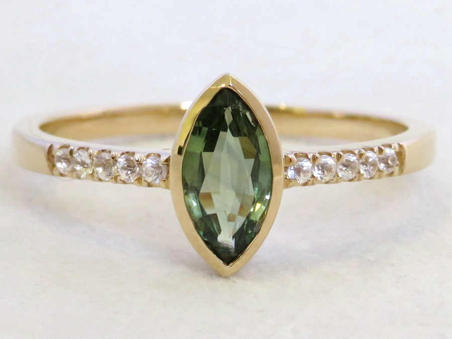 Teal Sapphire Ring with White Sapphire in 9k Yellow Gold