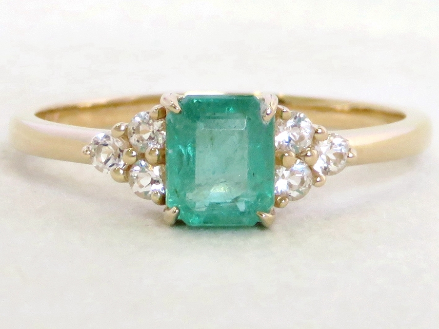 Emerald Ring with White Sapphire Clusters in 9k Yellow Gold