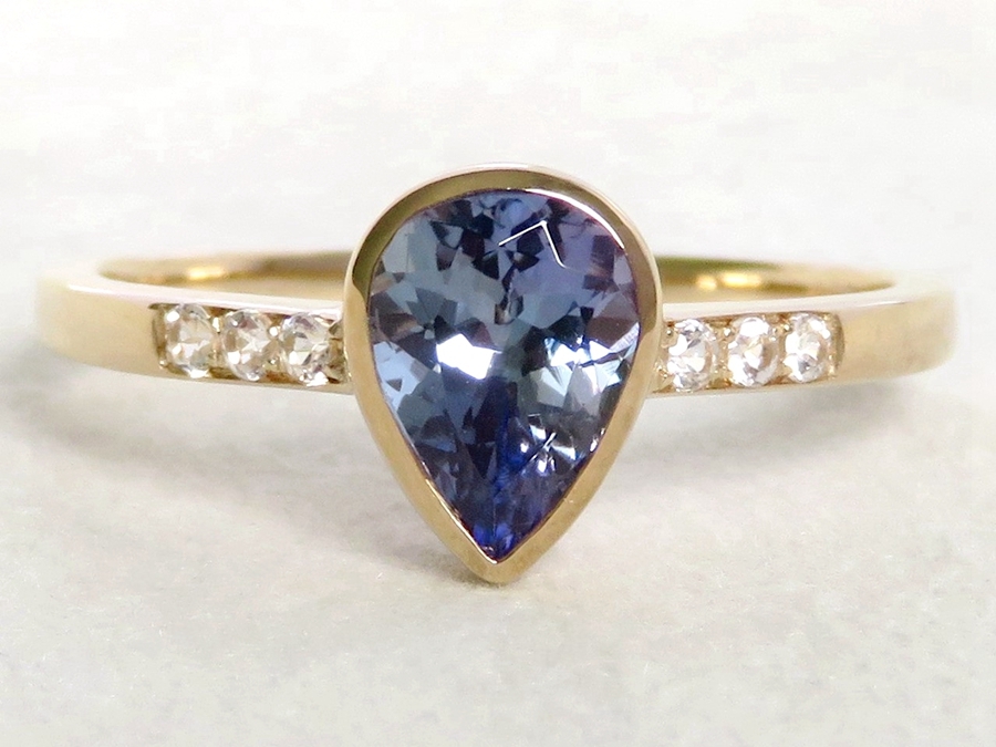 1.1ct Tanzanite Ring with White Sapphire in 9k Yellow Gold