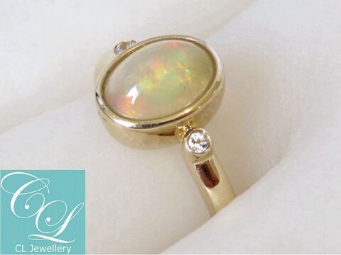Ethiopia Fire Opal & White Sapphire Ring in 9k Yellow Gold