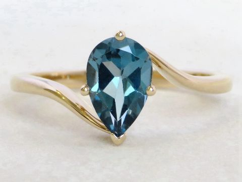 1.46ct London Blue Topaz Ring in 9k Yellow Gold Bypass Design
